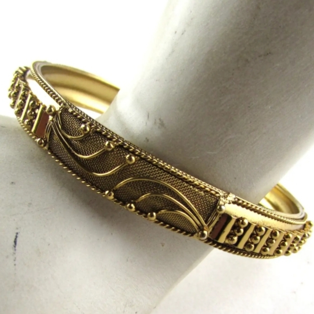 Elegant Gold Tone Decorated Bangle Bracelet